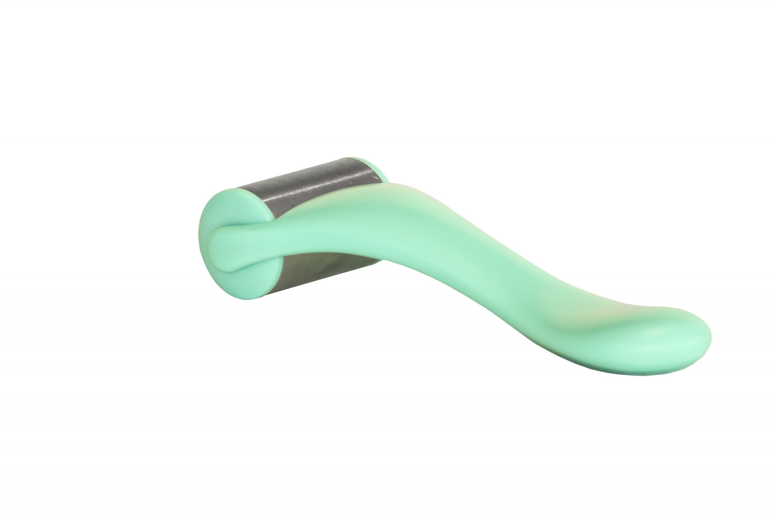 Green derma roller illustrating professional microneedling benefits and risks