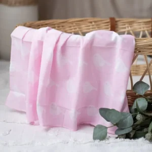 Muslin Baby Swaddle in the Pink Bird design, featuring a pink bird pattern